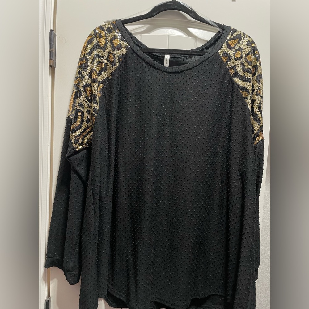 Black with sequin cheetah shoulders